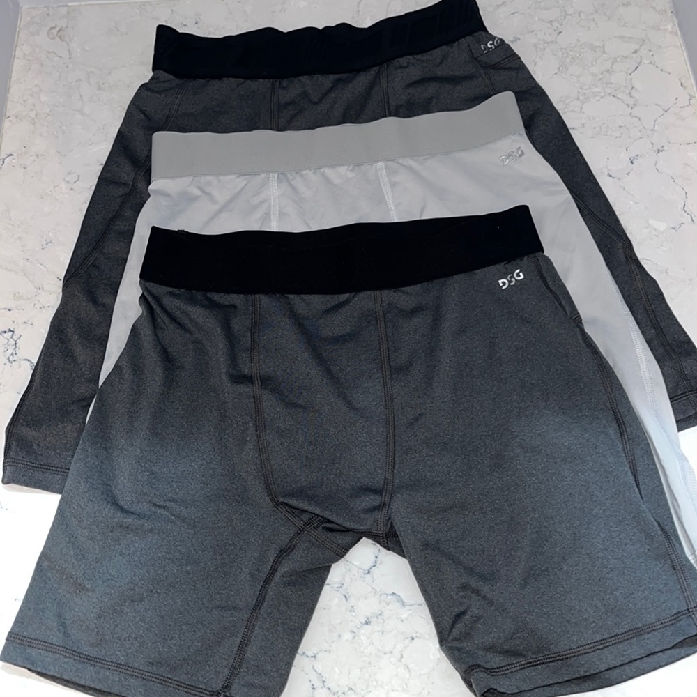 Three Dick’s Sporting Goods (DSG) half spandex for men. Size medium.